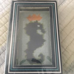 Jonathan Adler needlepoint paperweight